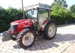 Ciągnik rolniczy Massey Ferguson 4707 widok z lewej strony