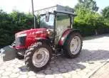 Ciągnik rolniczy Massey Ferguson 4707 widok z lewej strony