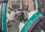 Wnętrze kabiny Arbos 5115 Advanced fotel operatora i kierownica