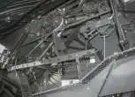 Napędy z lewej strony używanego kombajnu Fendt 6275 C koła pasowe paski przekładnie 