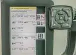 Włączony komputer pokładowy w Fendt 6275 C z wyświetlonymi informacjami ilość mtg  