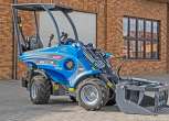 Multione seria 5 Kubota Korbanek od boku ramie łyżka z dociskiem