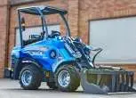 Multione seria 5 Kubota Korbanek bok ramię schowane łyżka z dociskiem