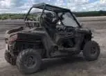 ciągnik rolniczy Polaris RZR 900 EPS używany lewy przód z ramą ochronną