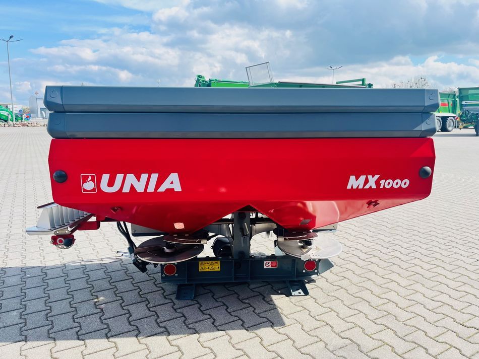 Precyzyjny zawieszany rozsiewacz nawozu Unia Group MX 1000 z limiterem i nadstawkami