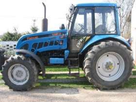 Używany niebieski ciągnik rolniczy Pronar 1221 A